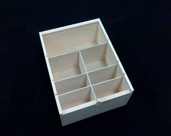 Custom slide top wood boxes with removable dividers.